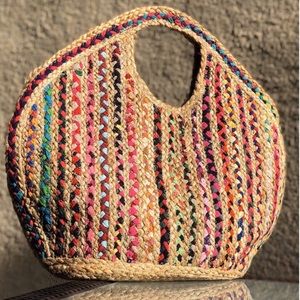 Beautiful multi colored straw bag. Perfect for the spring and summer.